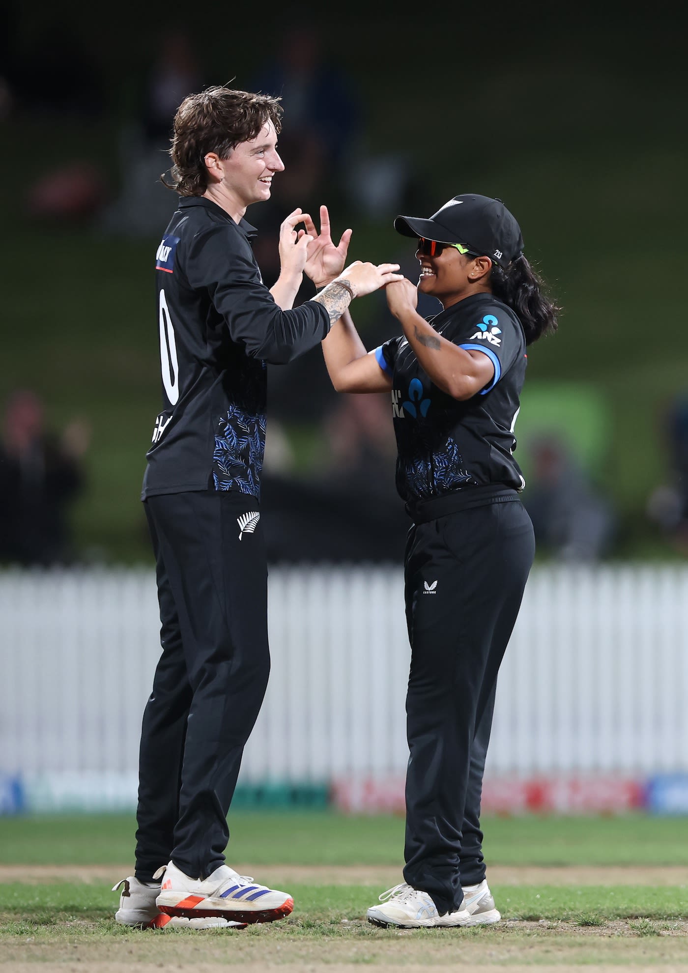 Kayley Knight celebrates a wicket with Nensi Patel