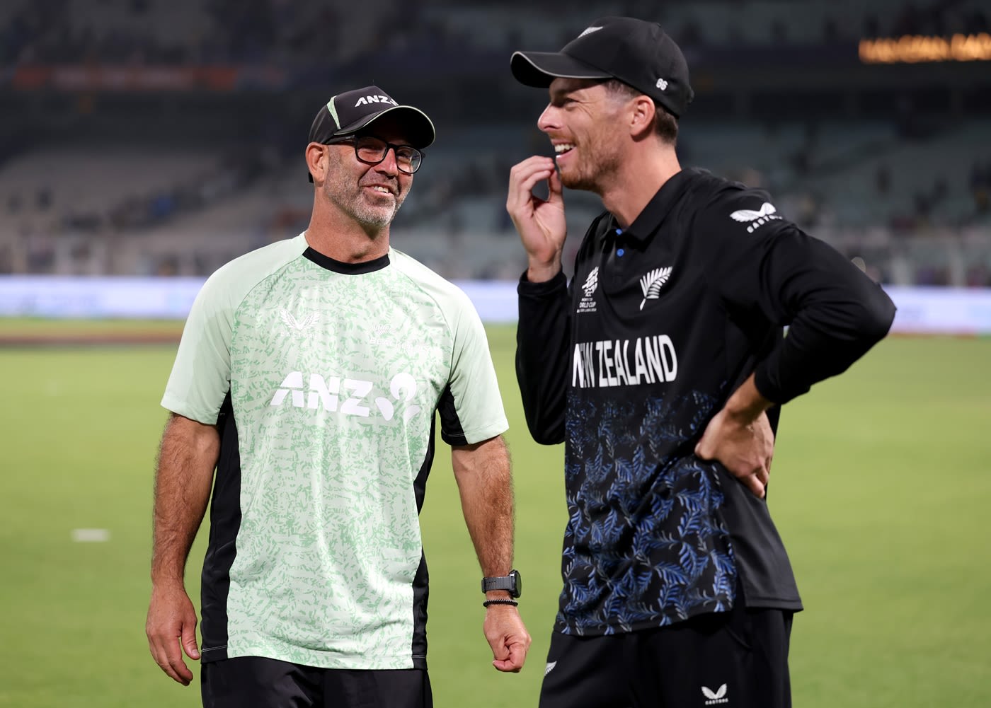 Head coach Rob Walter and captain Mitchell Santner have fun after the win