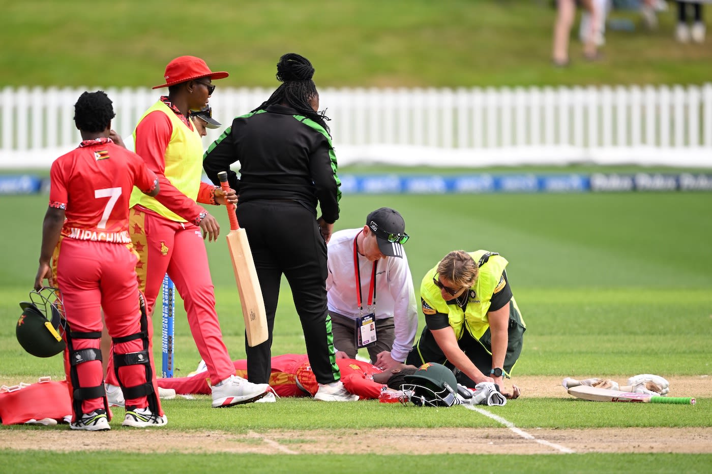 Kelis Ndhlovu lies on the ground after being hit by a bouncer