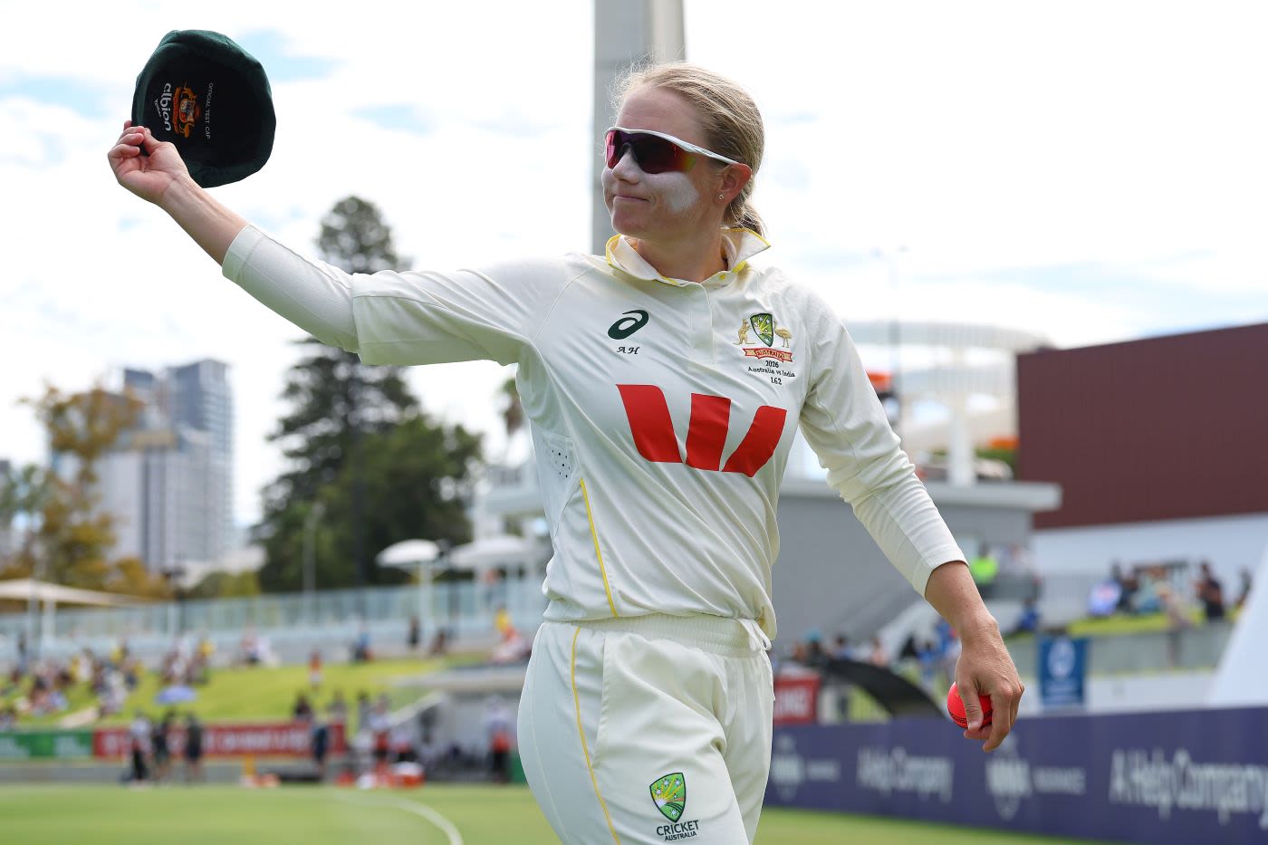 Alyssa Healy leads her team off for the final time