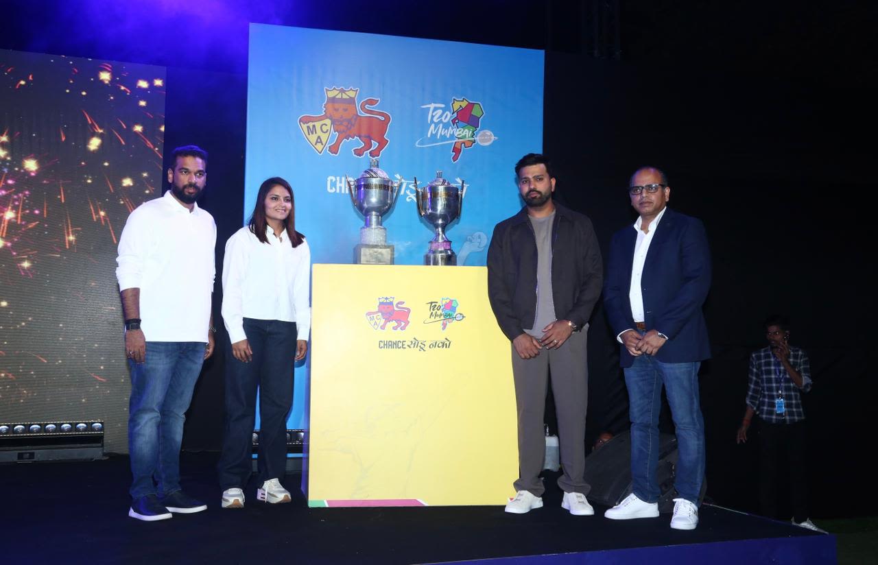 Mumbai Cricket Association president Ajinkya Naik, Sayali Satghare, Rohit Sharma and T20 Mumbai League Governing Council chair Rajdip Gupta unveil the two trophies