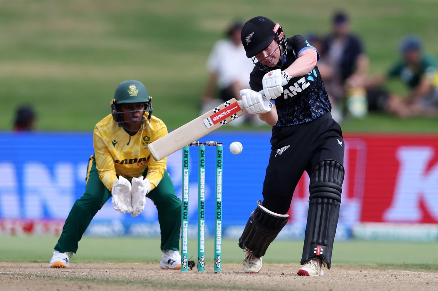 Georgia Plimmer prepares to whack the ball