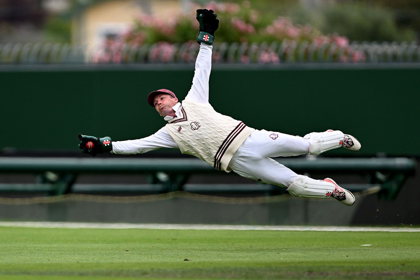 Go, Go Gadget arms: Jimmy Peirson dives for a take