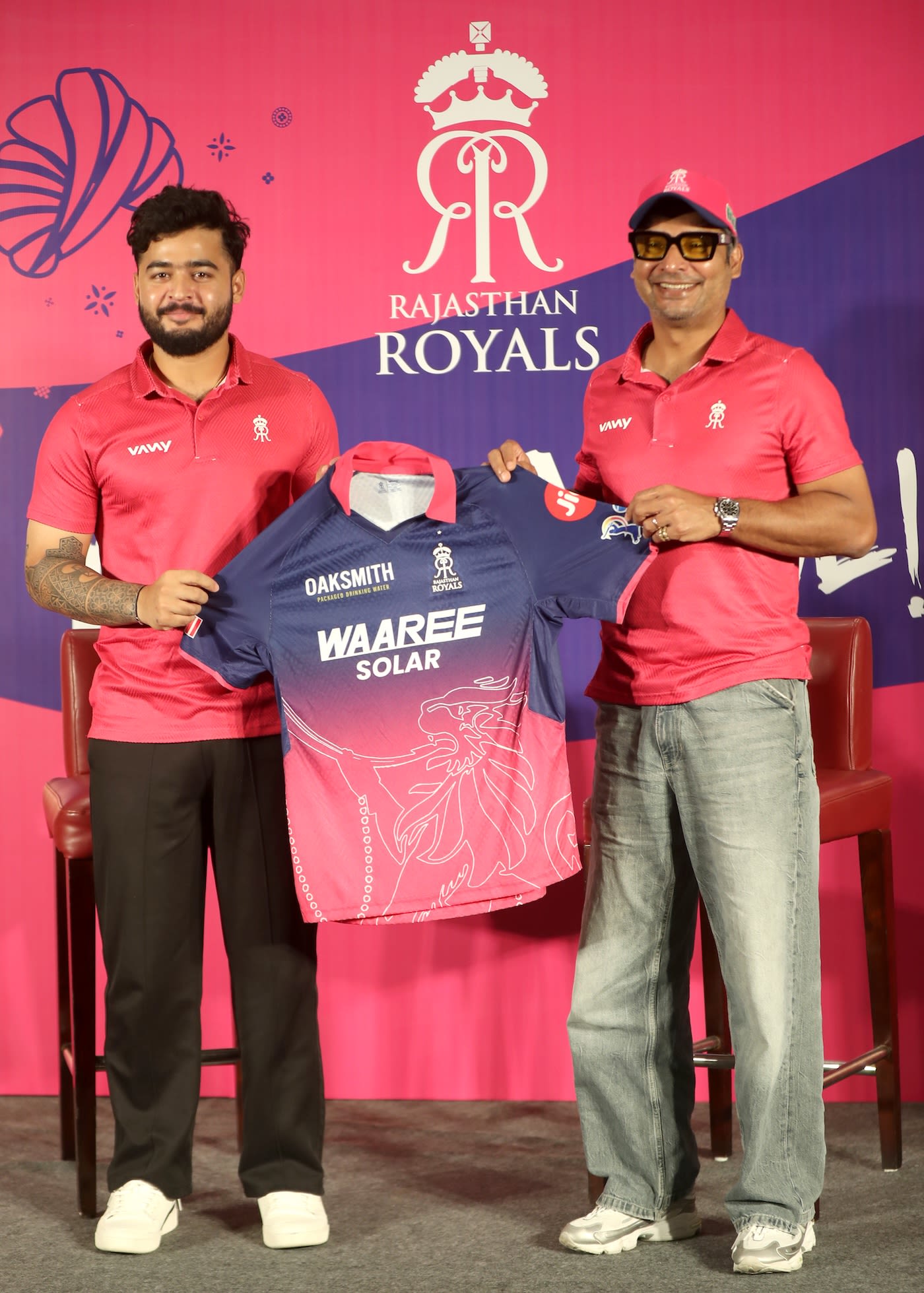 Riyan Parag and Kumar Sangakkara with the new Rajasthan Royals jersey