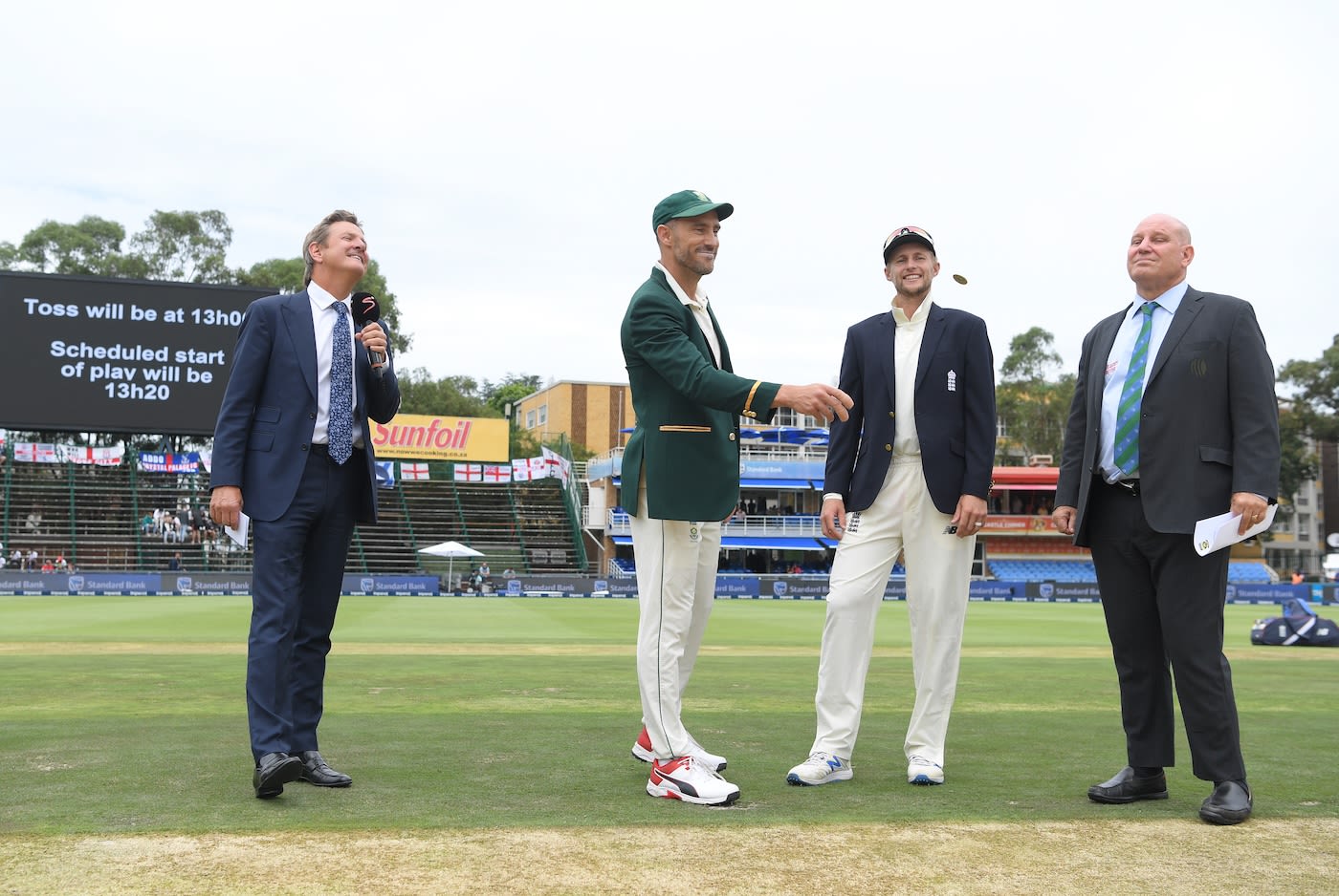 The captains at the toss