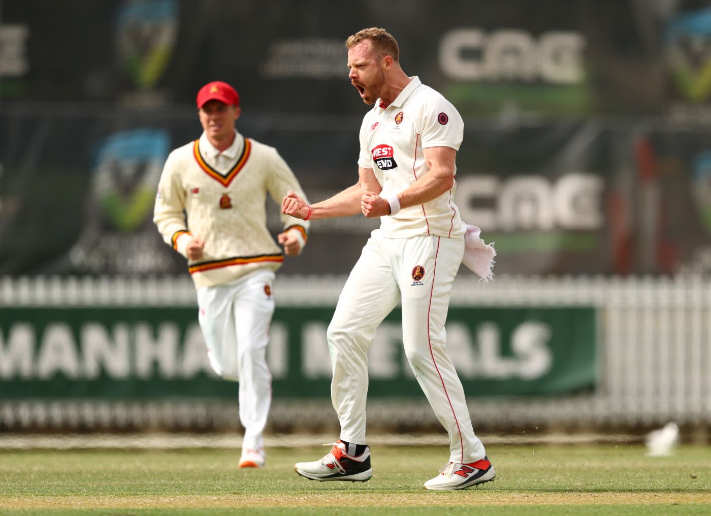 Nathan McAndrew celebrates a wicket