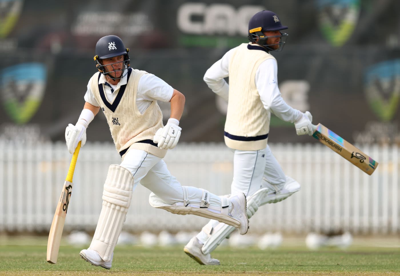Marcus Harris and Fergus O'Neill run between wickets