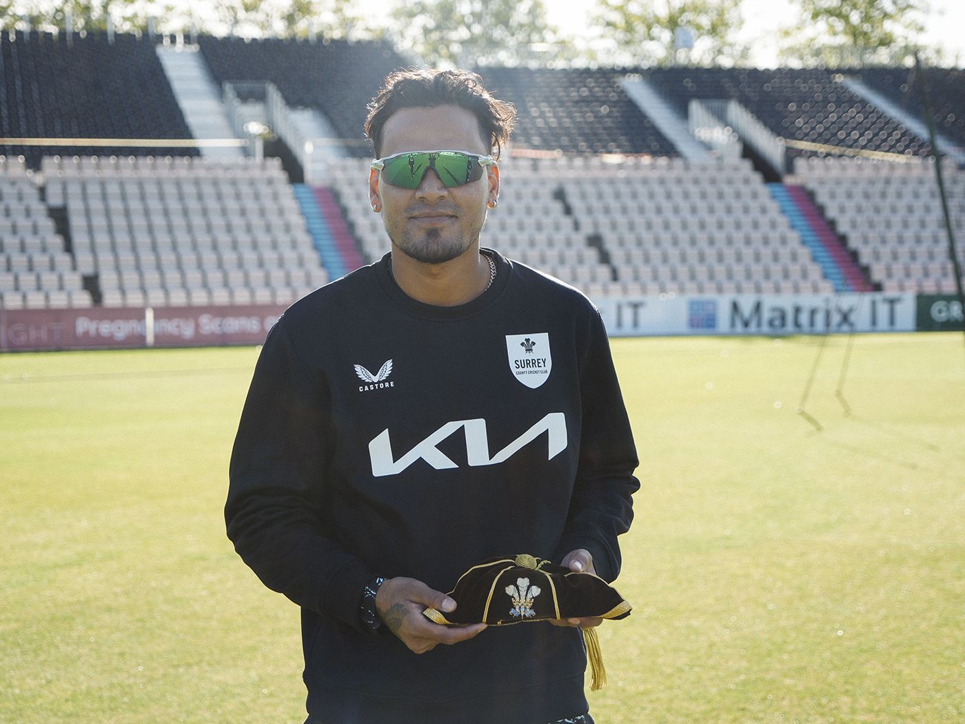Rahul Chahar with his Surrey cap