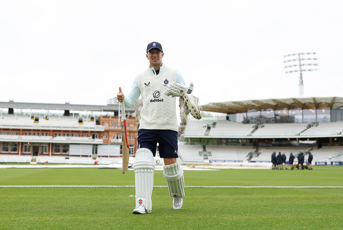 Josh De Caires heads towards the nets
