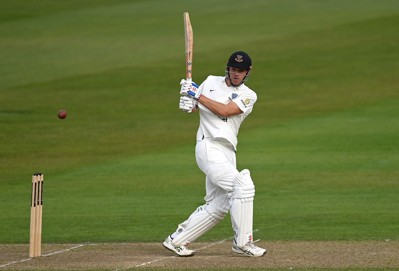 Tom Clark swings away a pull during his century