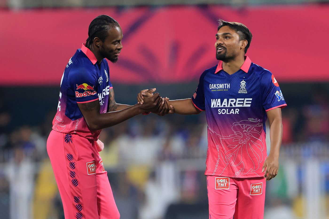 Sandeep Sharma and Jofra Archer celebrate in the middle