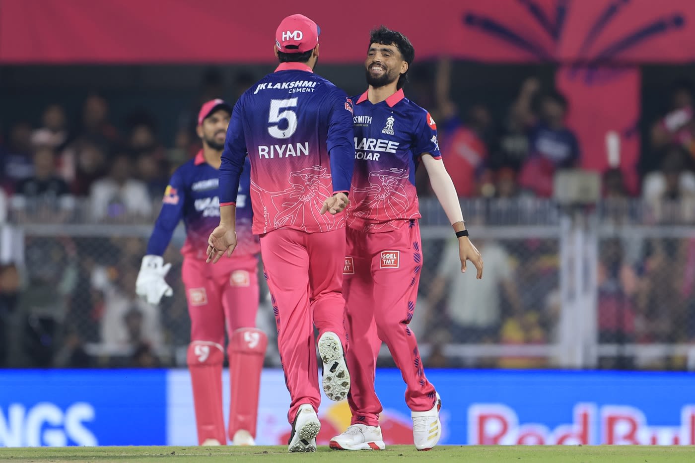 Brijesh Sharma celebrates with his skipper Riyan Parag