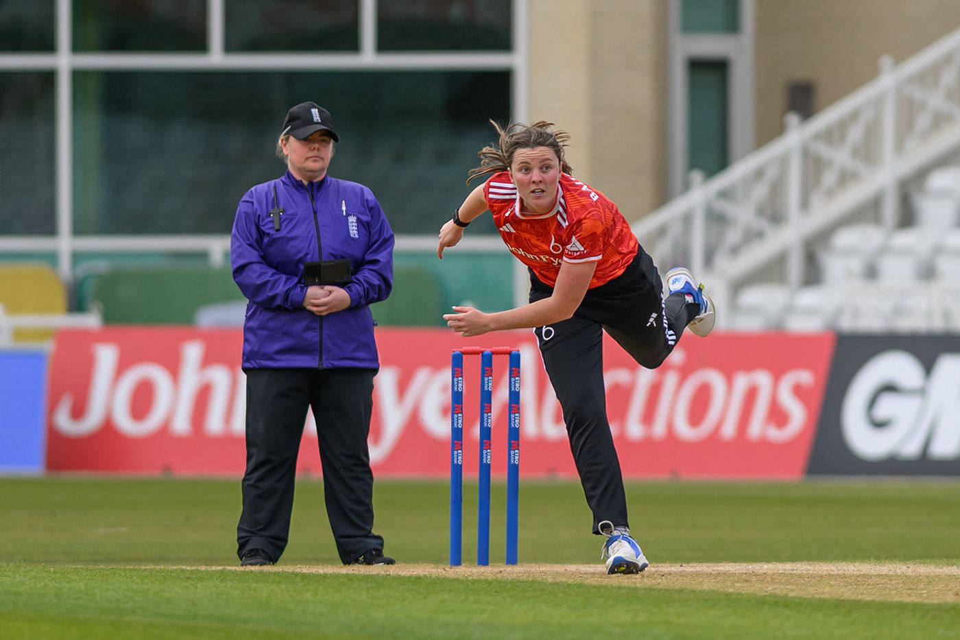 Grace Ballinger on her way to a three-wicket haul