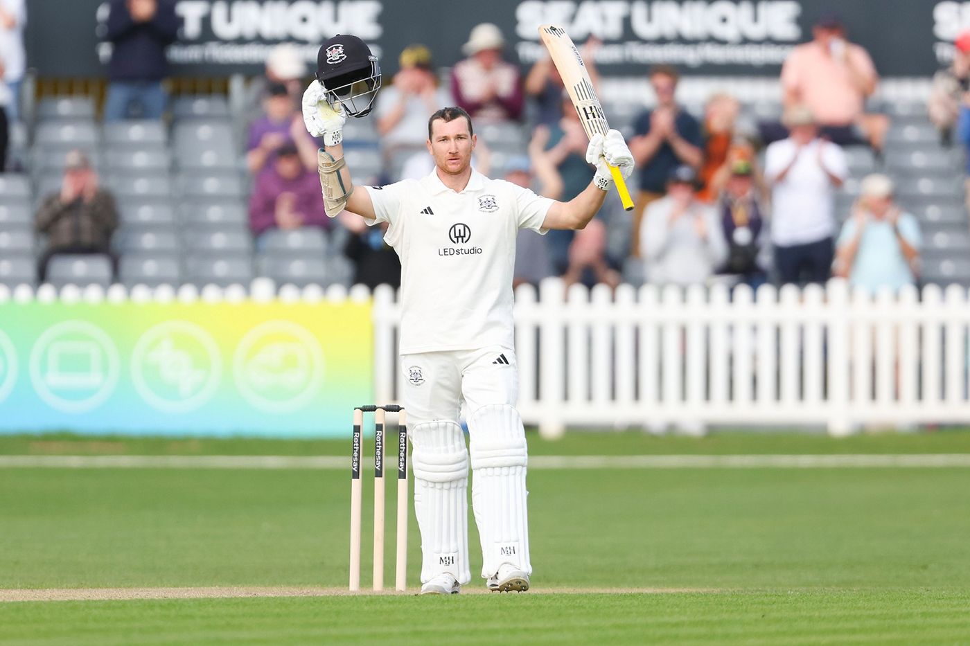 James Bracey acknowledges applause for his century