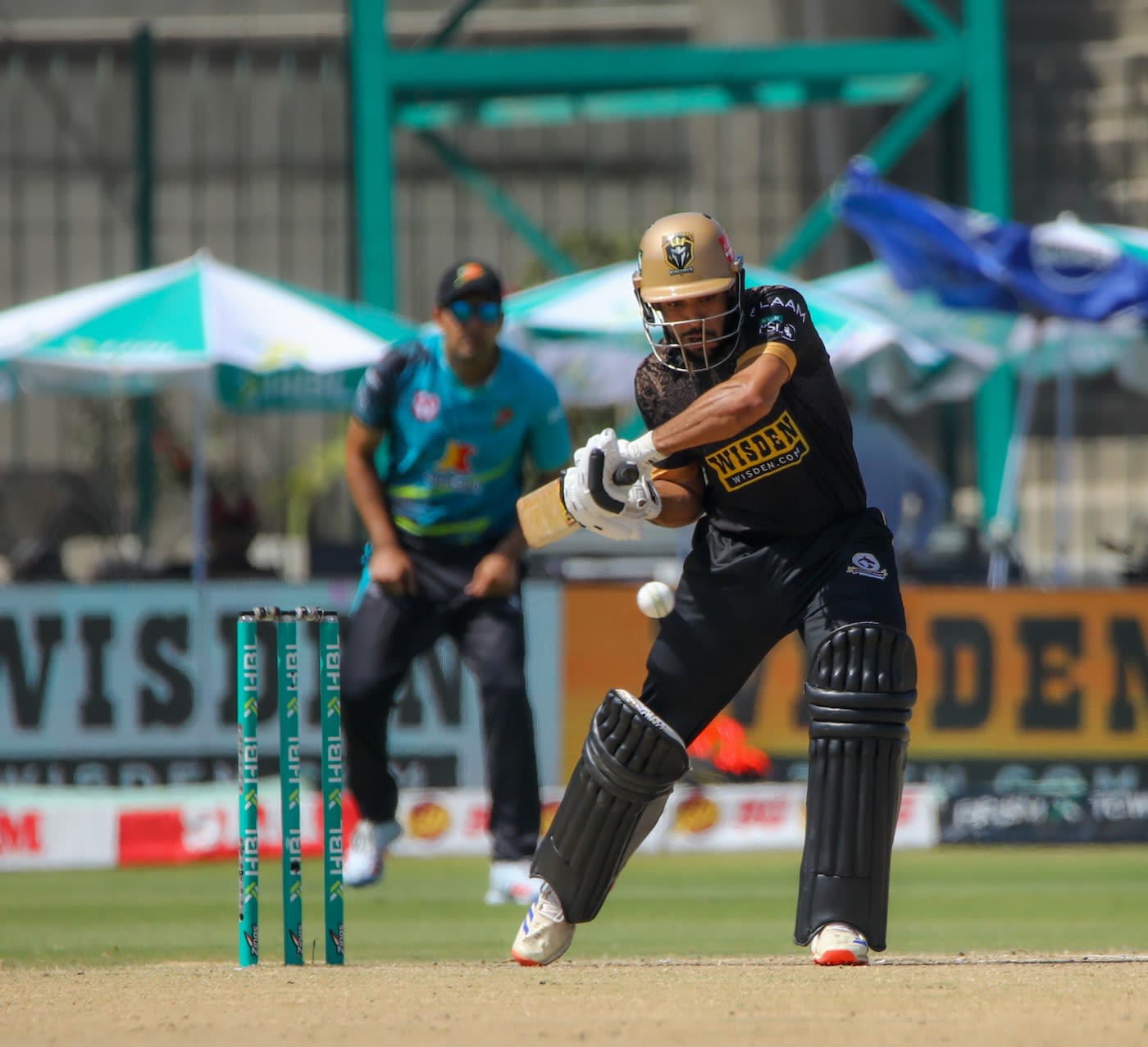 Usman Khan watches the ball closely