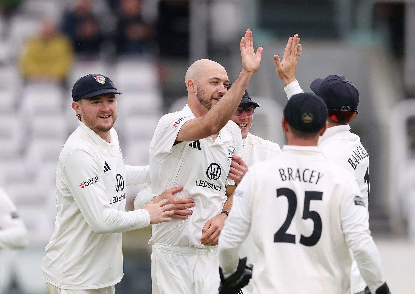 Gabe Bell celebrates a wicket