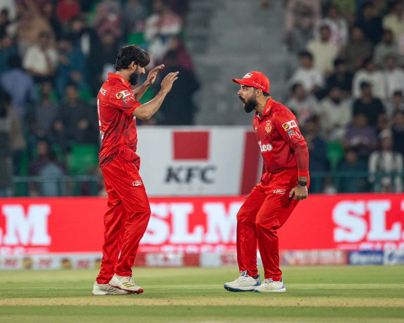 Shadab Khan celebrates an Imad Wasim wicket