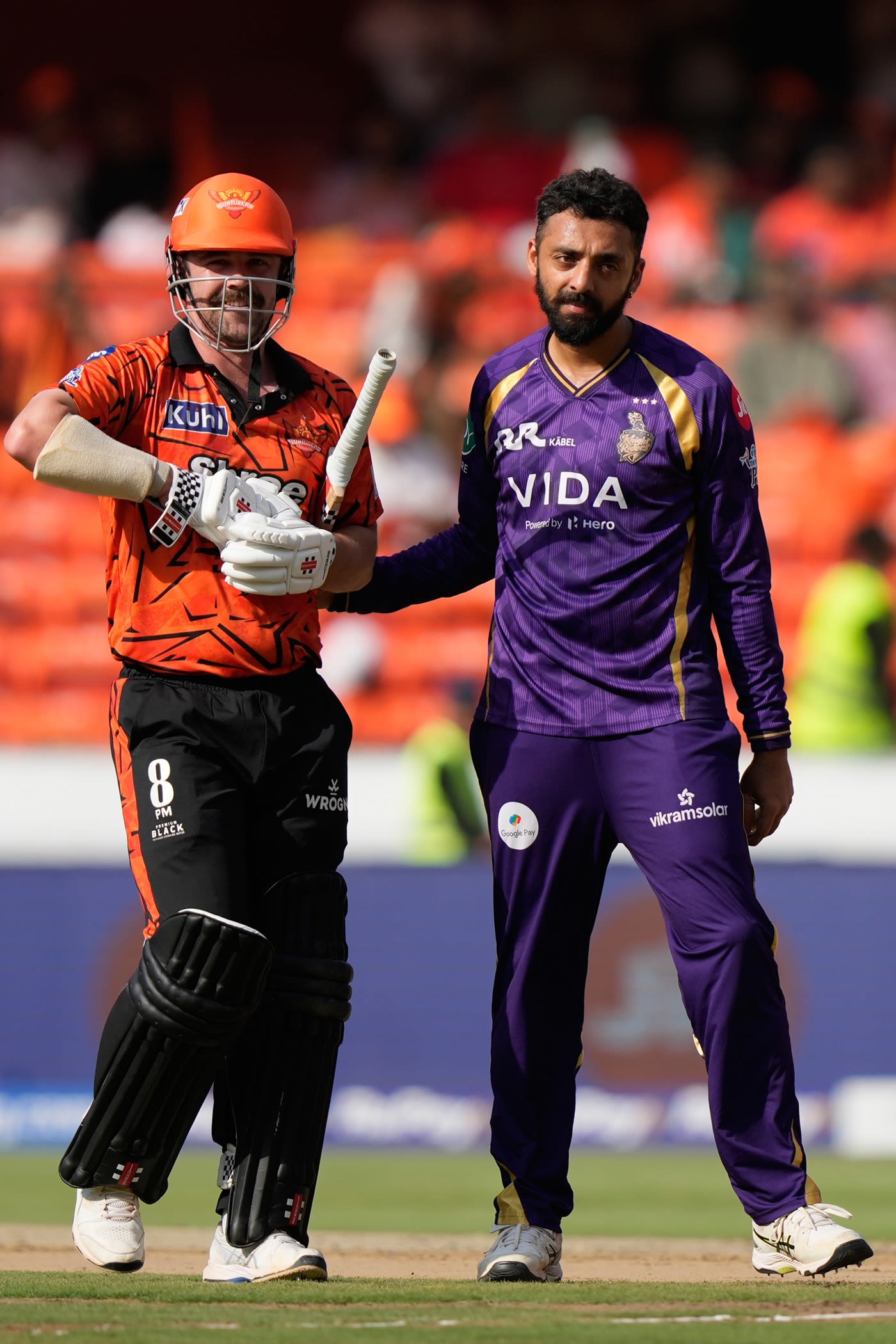 Varun Chakravarthy gave Travis Head a pat after dismissing him