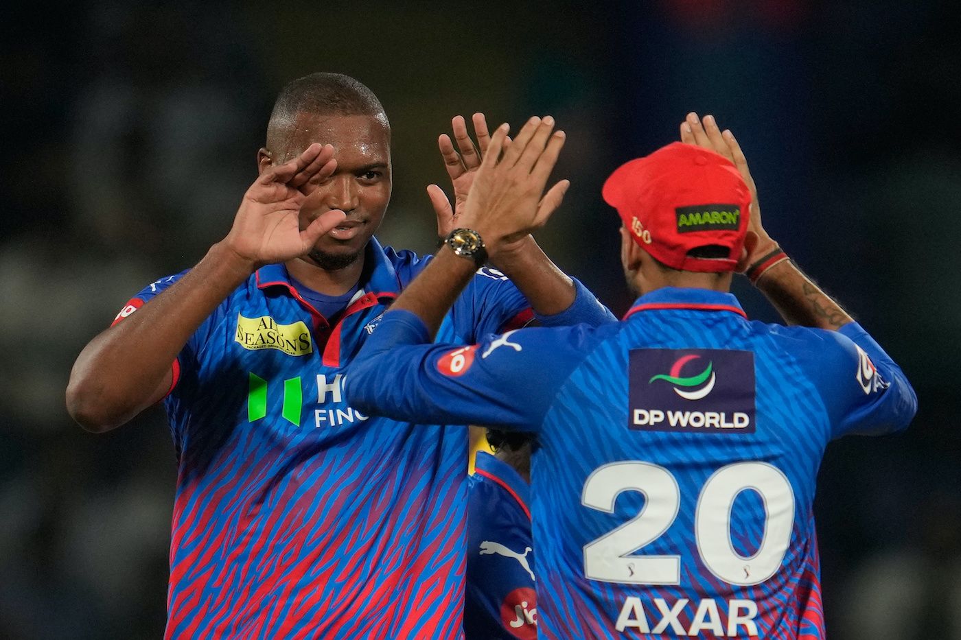 Lungi Ngidi celebrates Ruturaj Gaikwad's wicket with Axar Patel