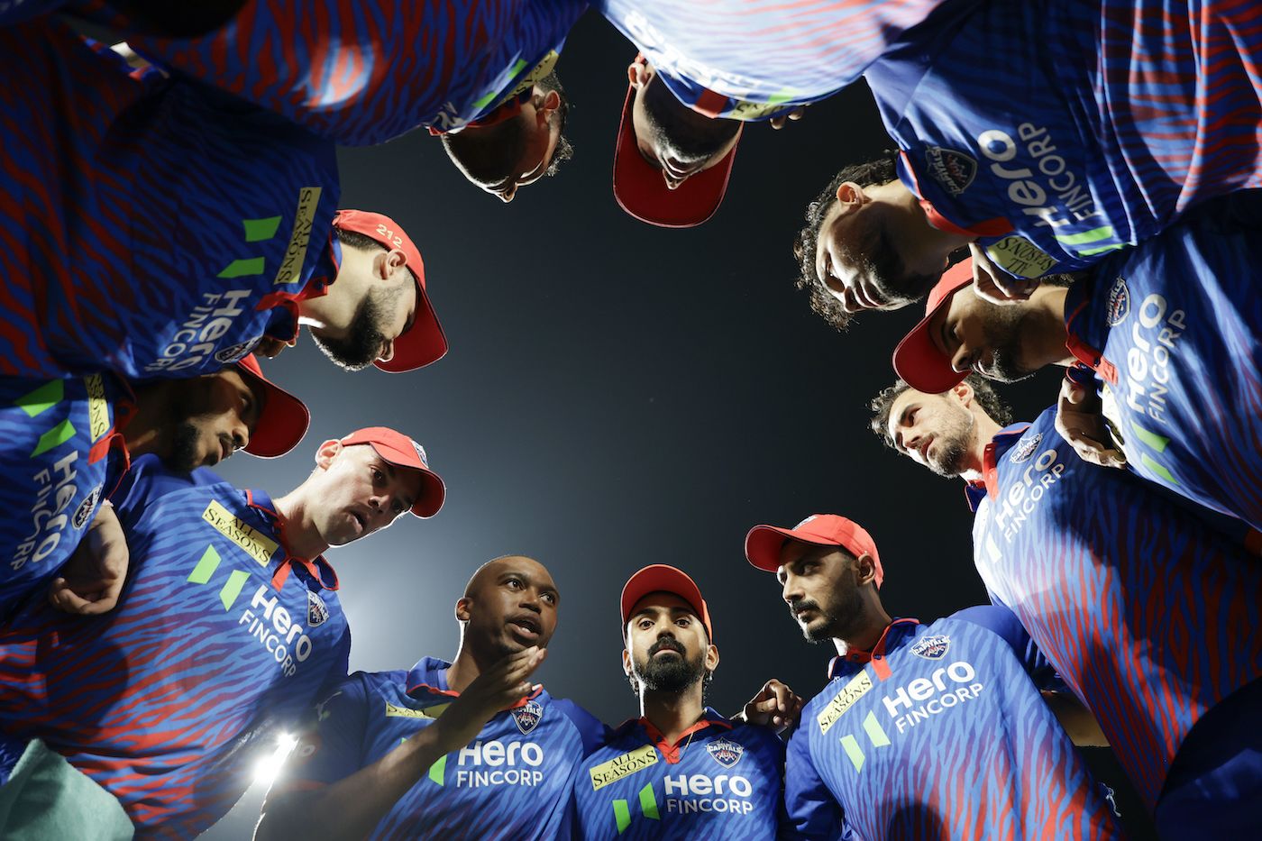 Delhi Capitals get into a huddle at the start of the chase