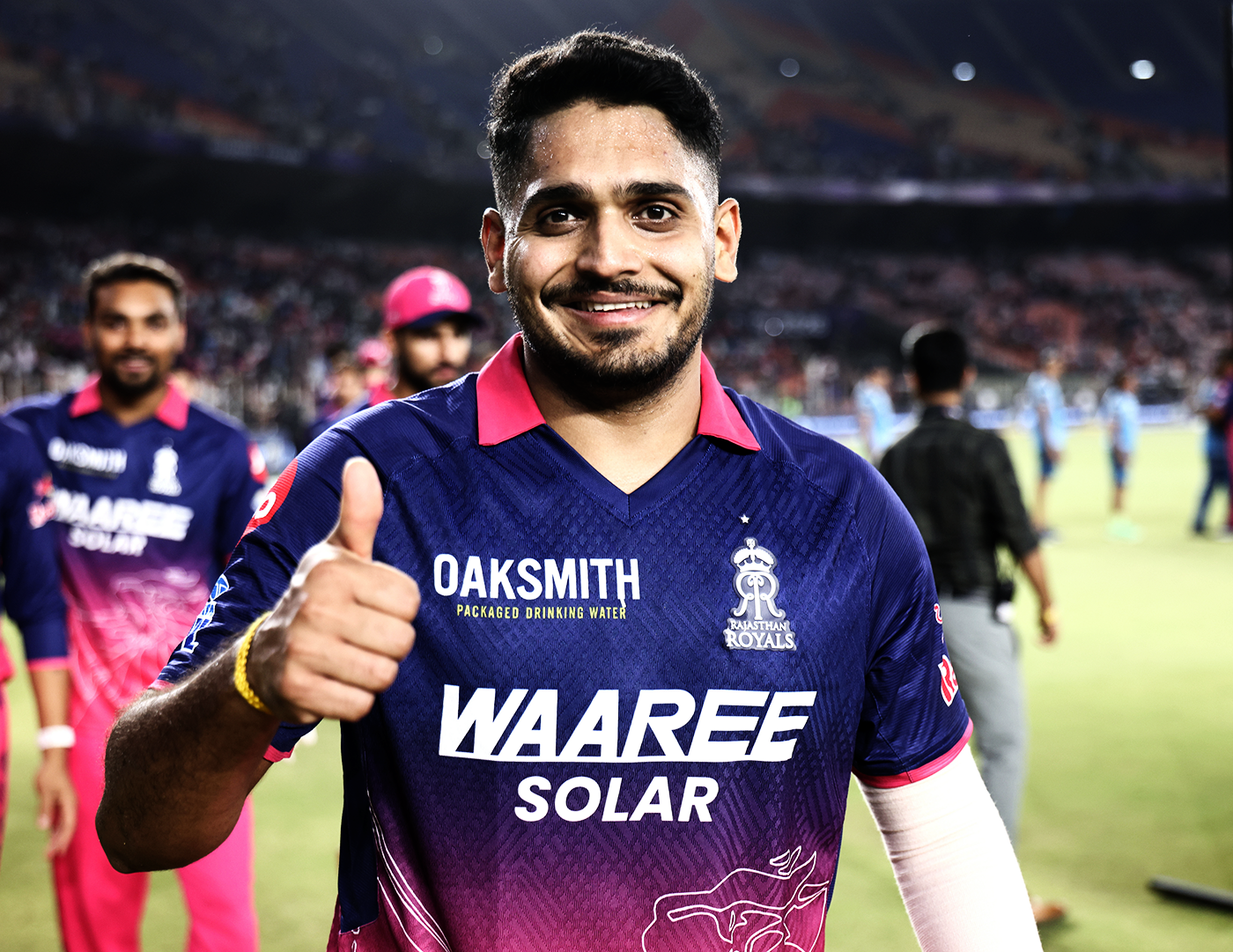 Tushar Deshpande gives a thumbs-up sign