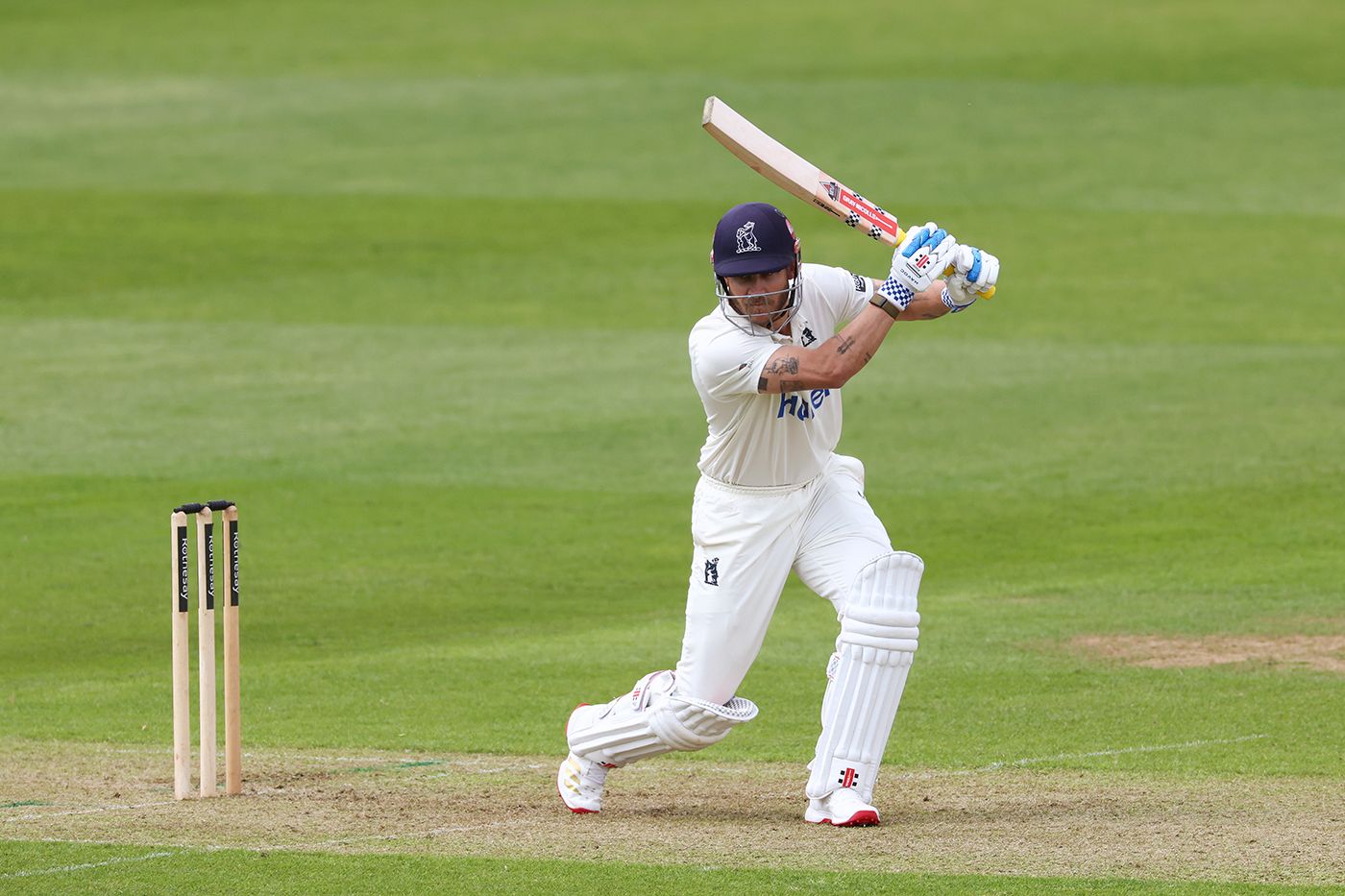 Sam Hain held firm as wickets tumbled