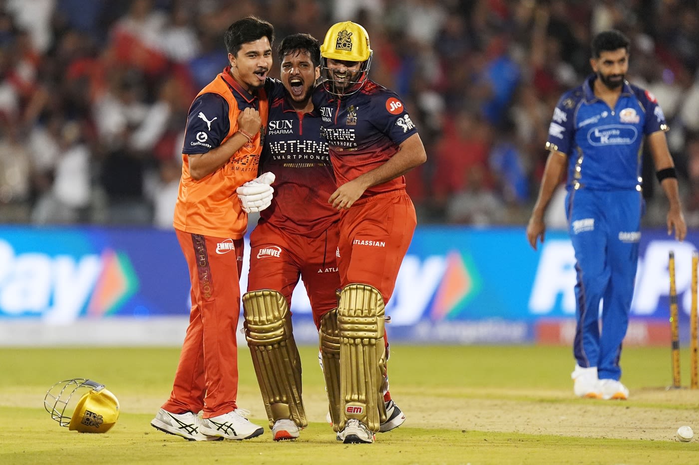 Bhuvneshwar Kumar and Rasikh Salam celebrate after Royal Challengers Bengaluru won a last-ball thriller
