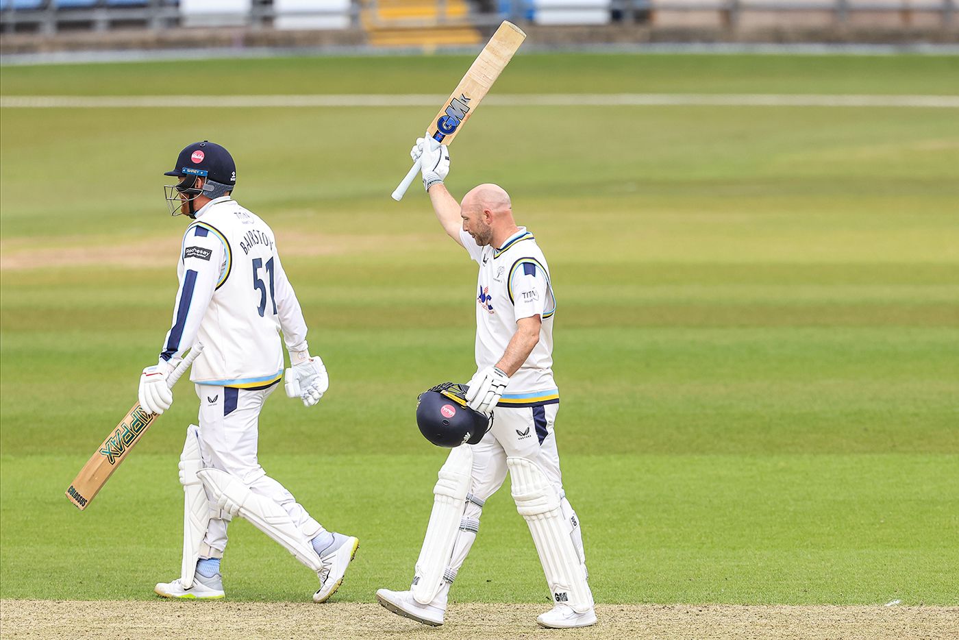 Adam Lyth raises the bat for his century