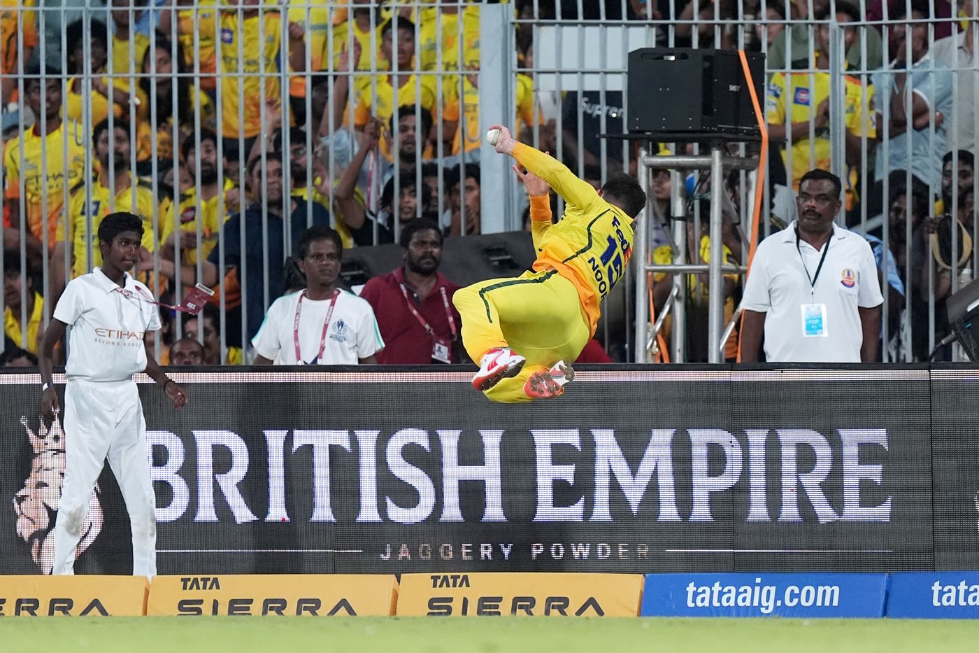 Noor Ahmad with an acrobatic save in the deep