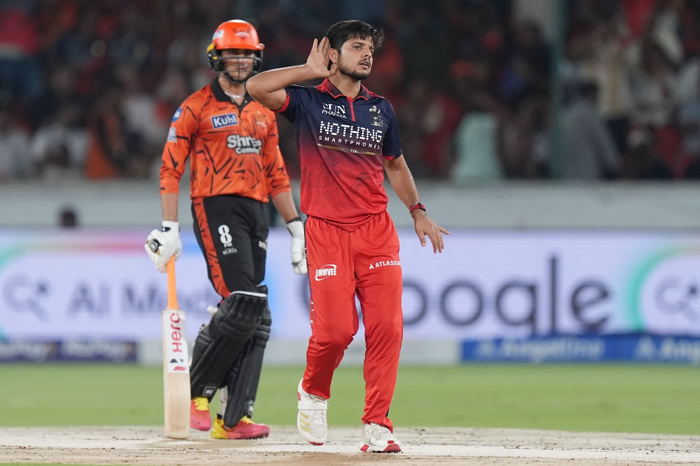 Rasikh Salam celebrates after getting rid of Travis Head