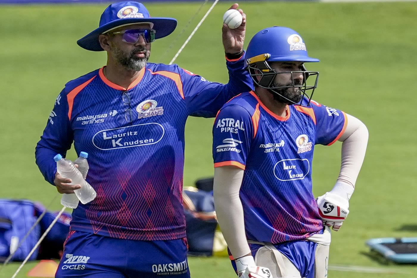 Rohit Sharma with MI bowling coach Paras Mhambrey at a training session