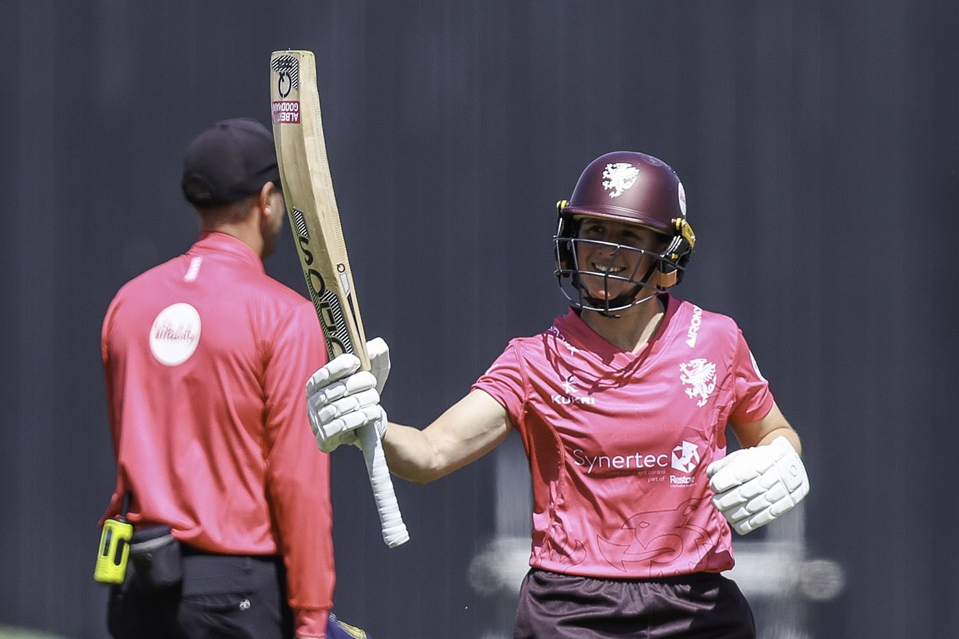 Sophie Luff is congratulated for scoring a half-century