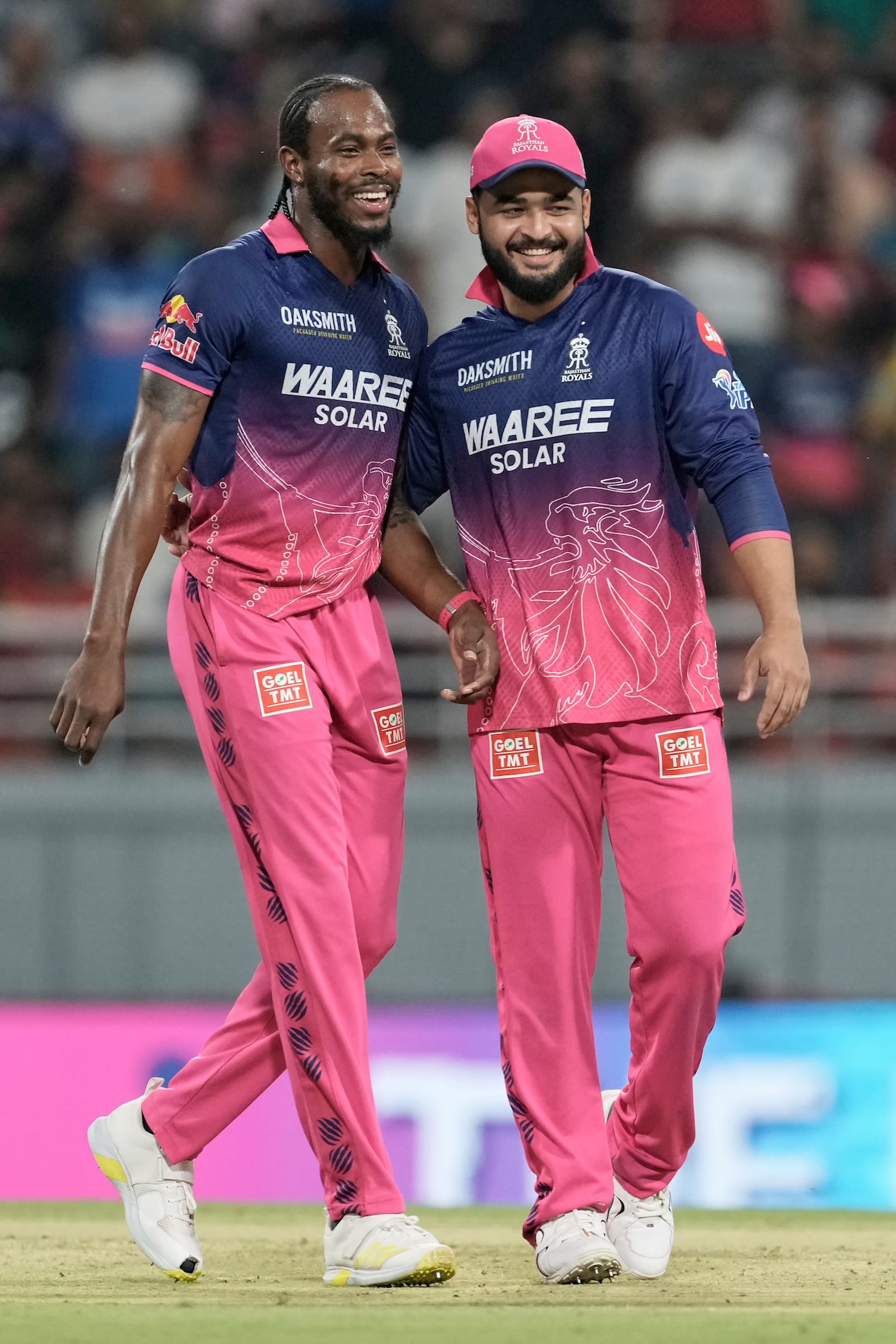 Jofra Archer and Riyan Parag celebrate Travis Head's wicket