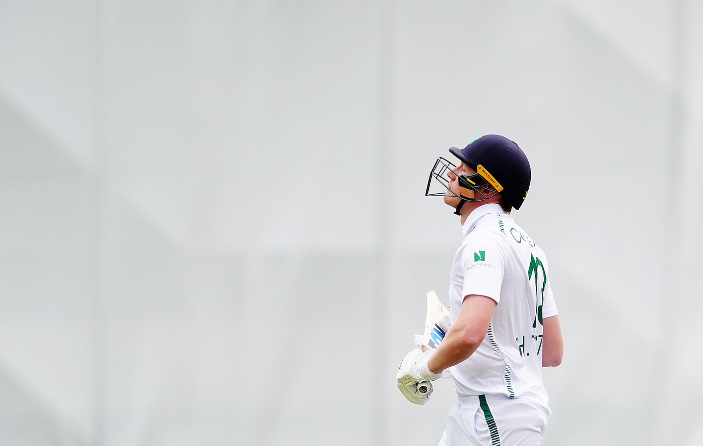 Harry Tector walks off after being dismissed for 2
