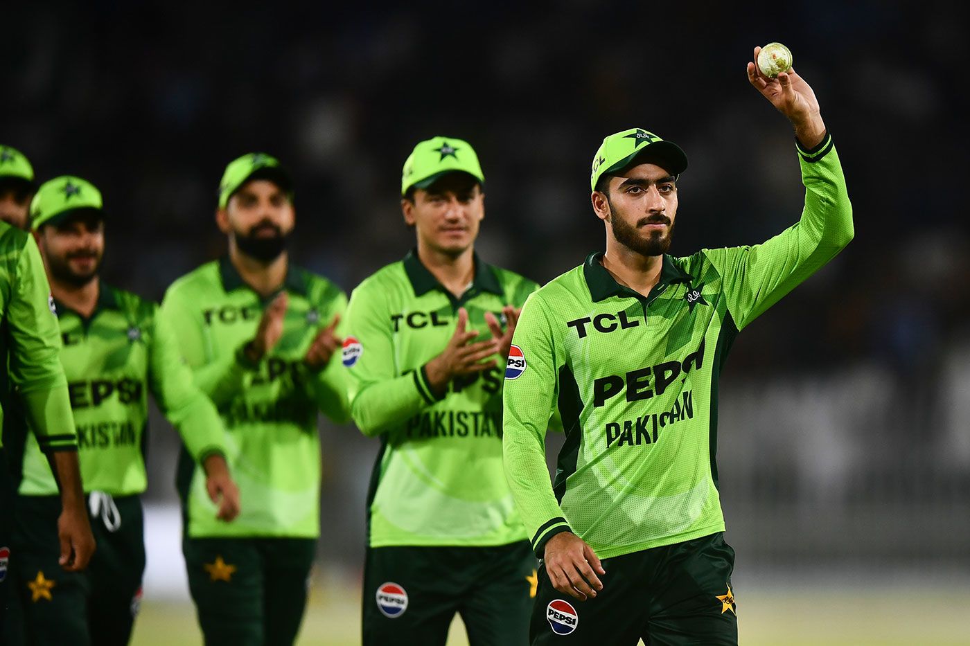 Arafat Minhas walks off after his debut five-wicket haul
