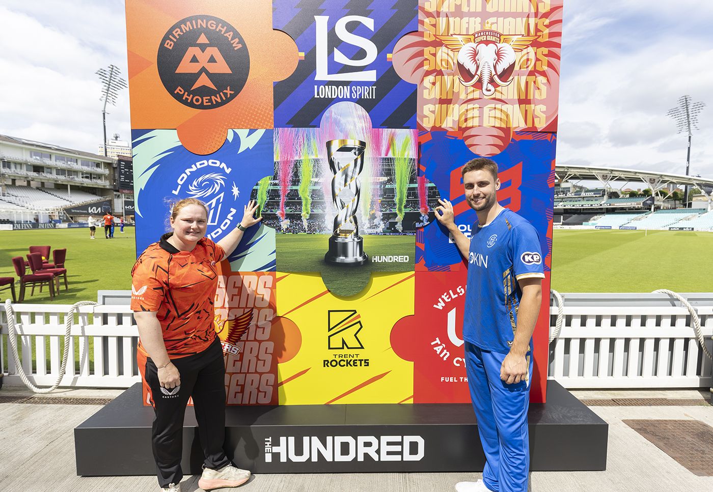 Bryony Smith and Will Jacks pose with the new 'overall' Hundred trophy