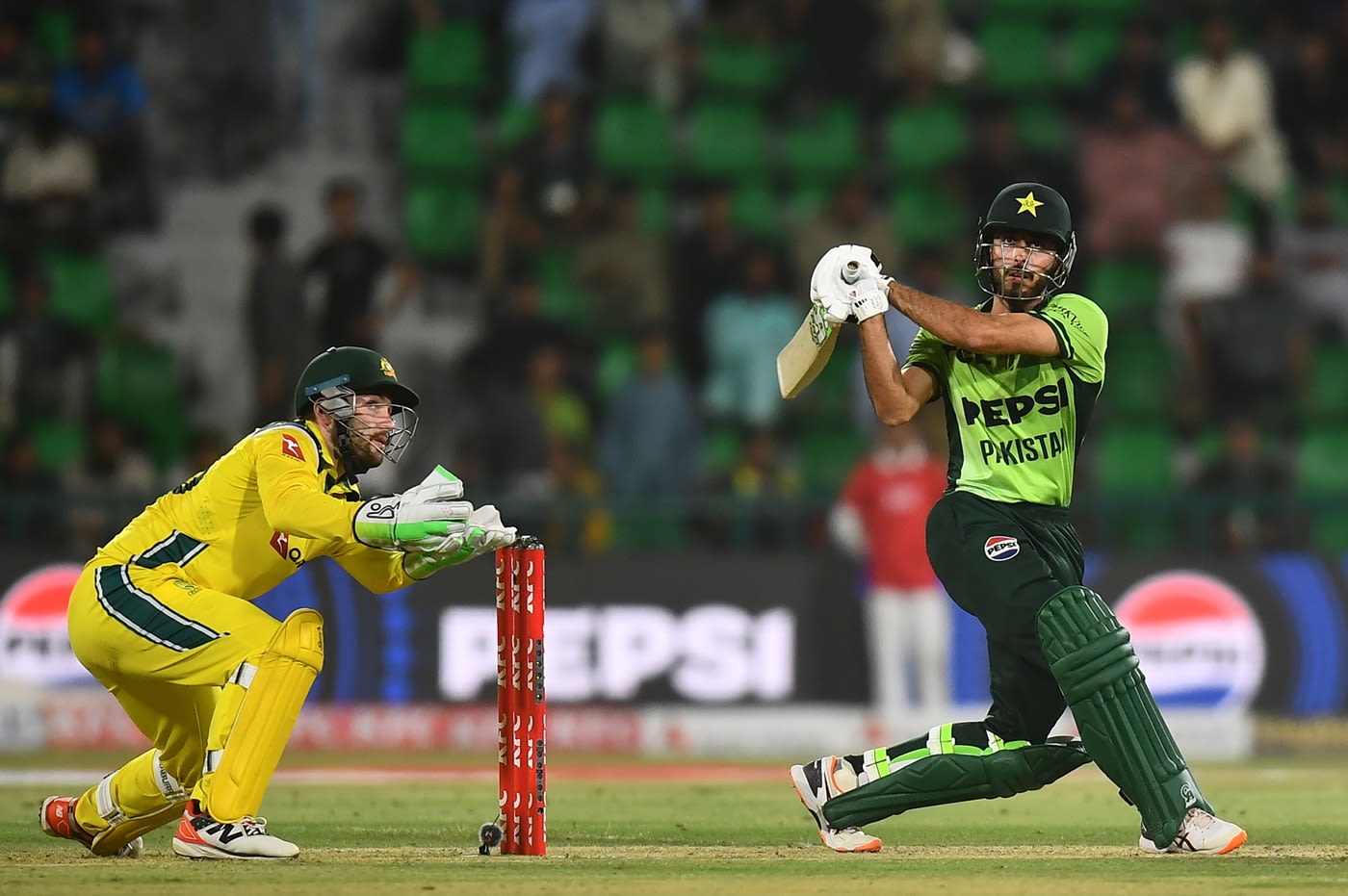 Arafat Minhas swings the ball away