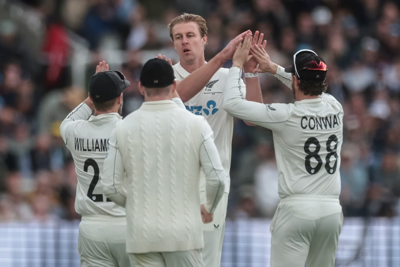 Kyle Jamieson celebrates a wicket with his team-mates