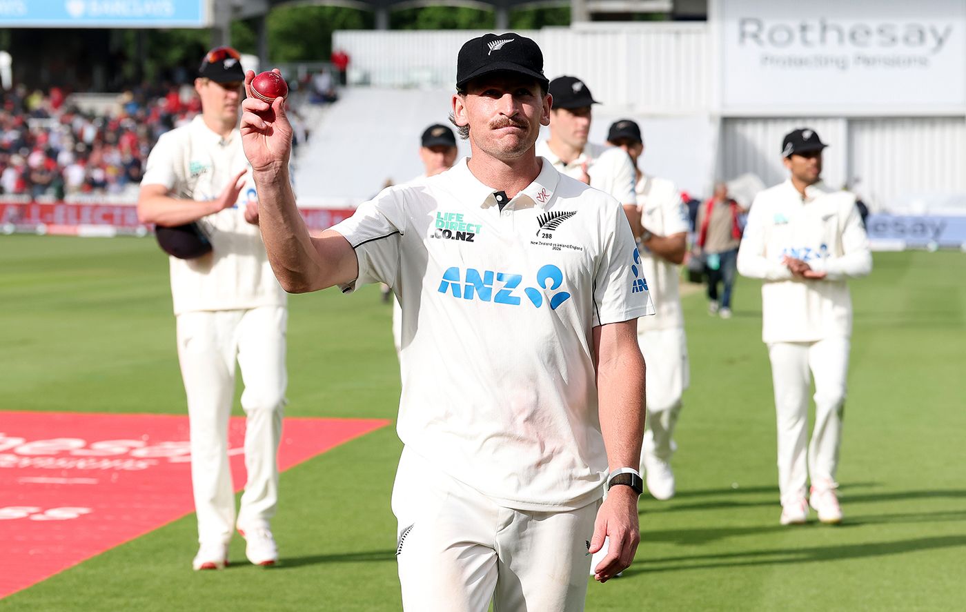 Nathan Smith holds the match ball after taking 6 for 70