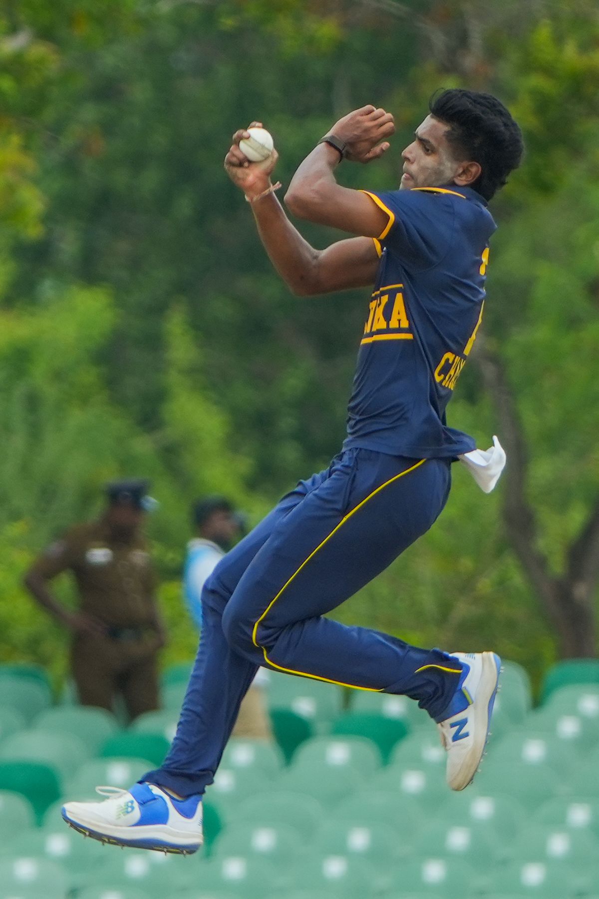 Chamika Gunasekara bowls