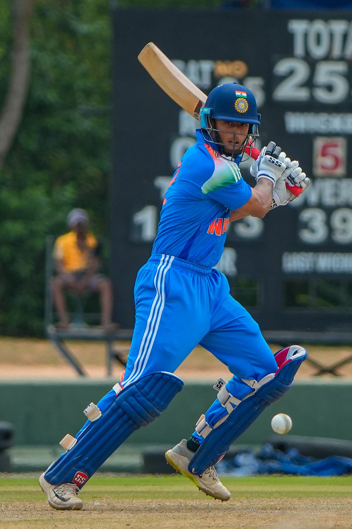 Suryansh Shedge punches the ball away
