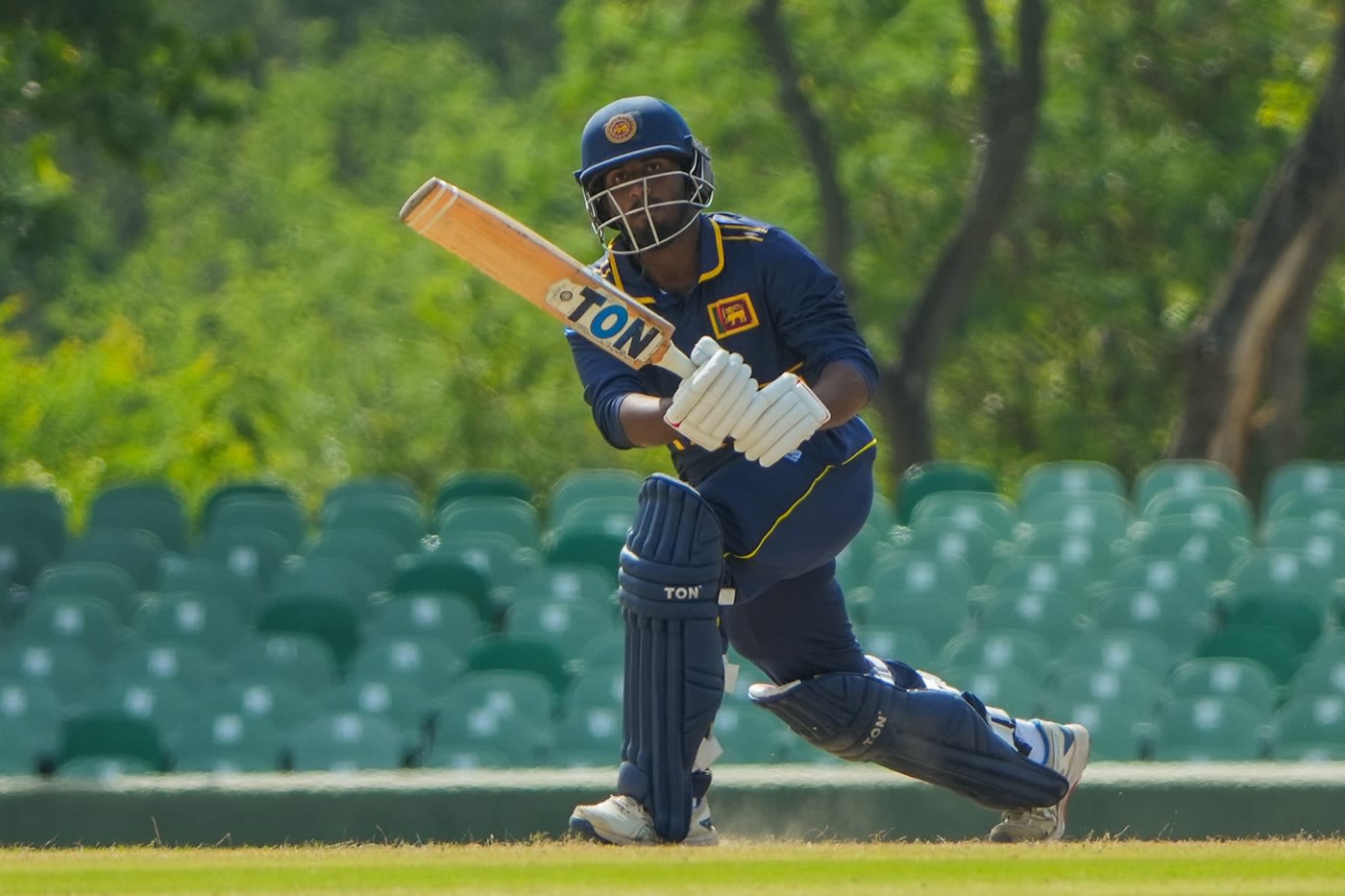 Vishen Halambage whips the ball into the leg side