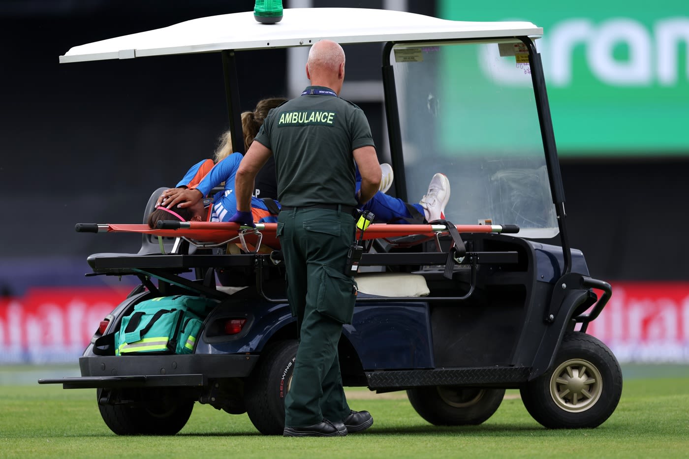 Shreyanka Patil is stretchered off the field following her ankle injury