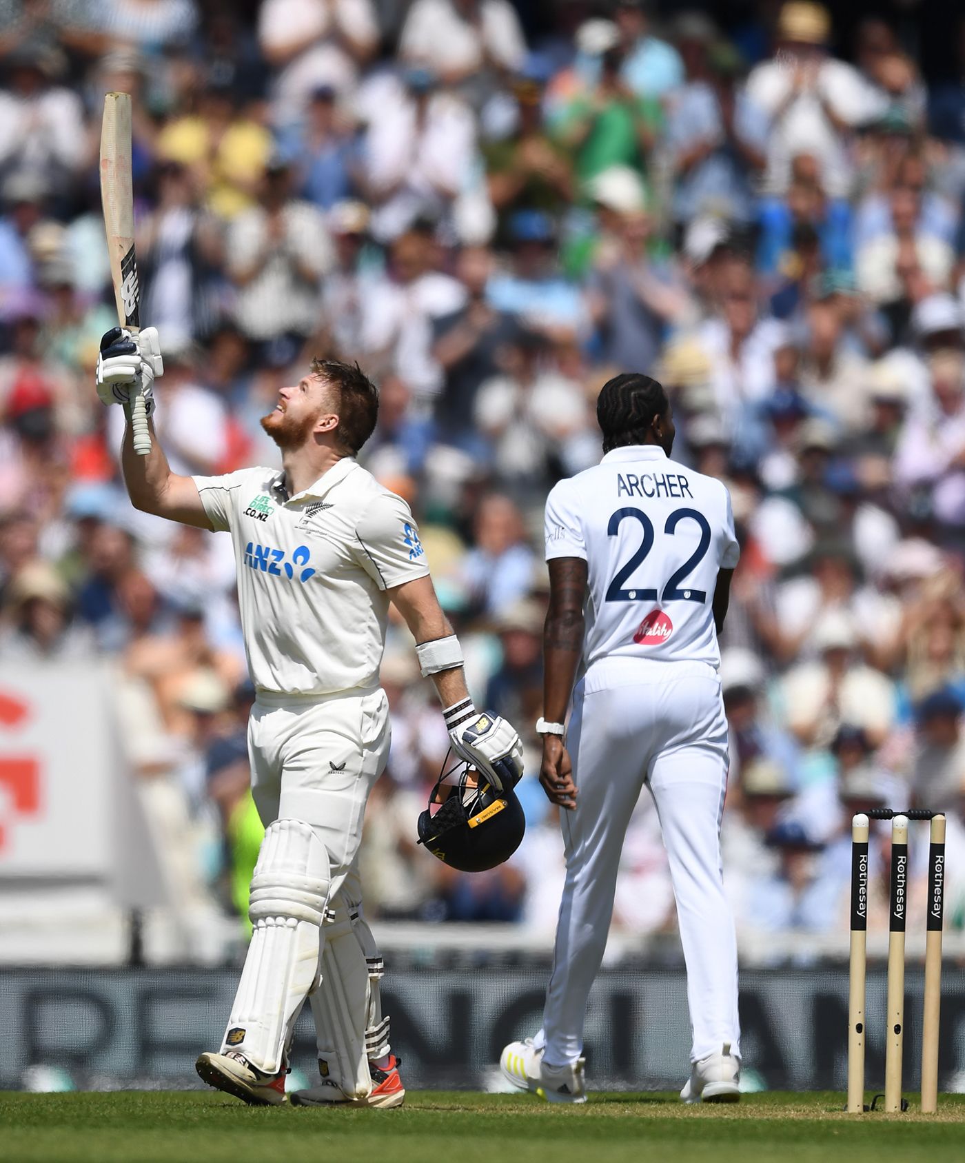 Glenn Phillips looks to the sky after bringing up his century