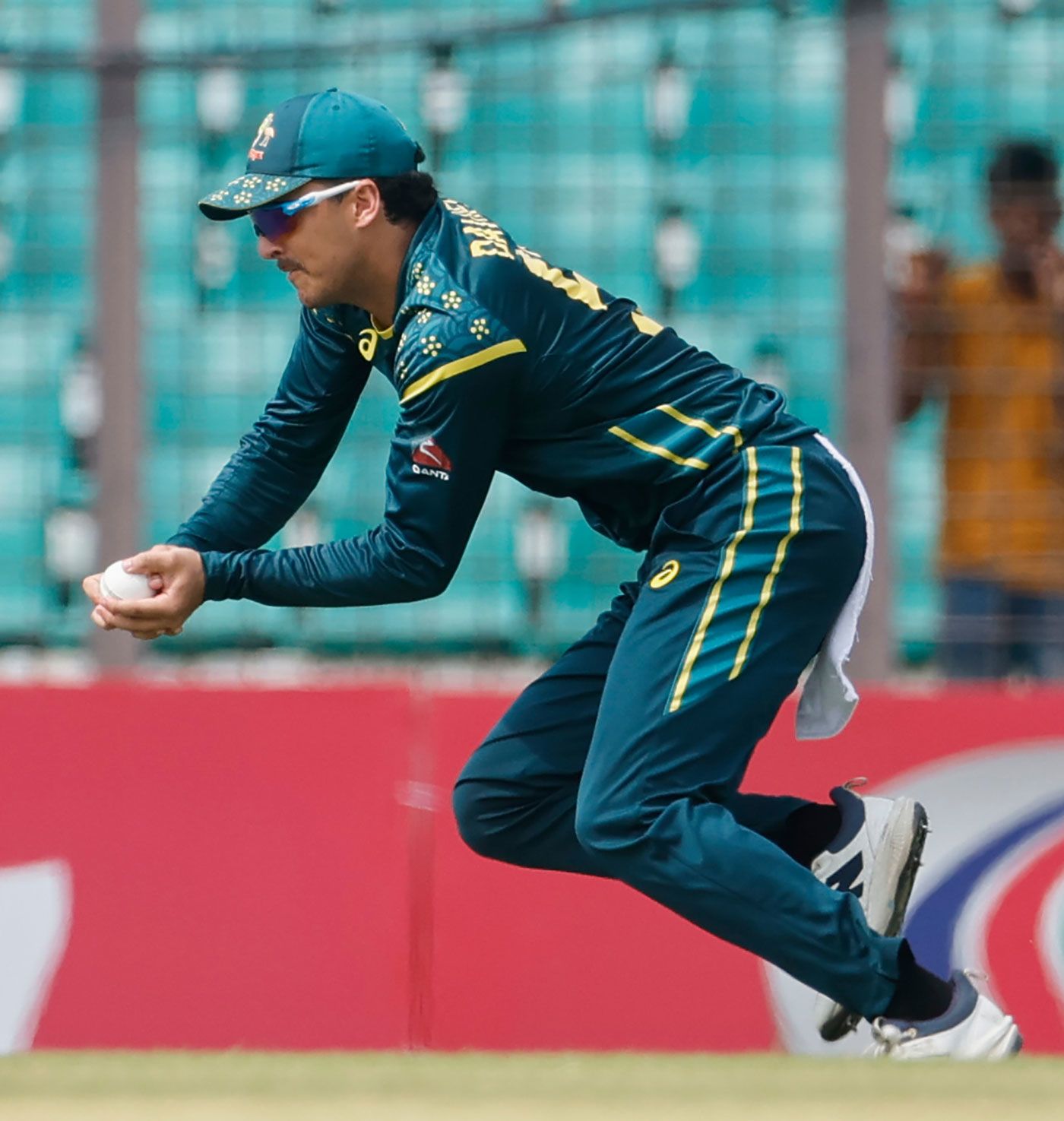Joel Davies takes a catch on a day of sharp fielding by Australia