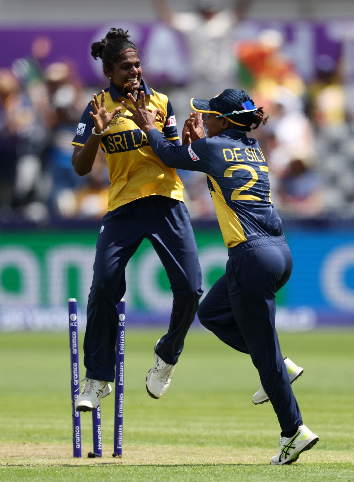 Nilakshika Silva and Mithali Ayodhya celebrate a direct-hit to remove Hayley Matthews