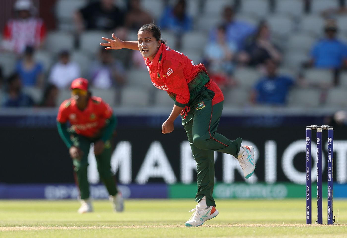 Nahida Akter runs in to bowl