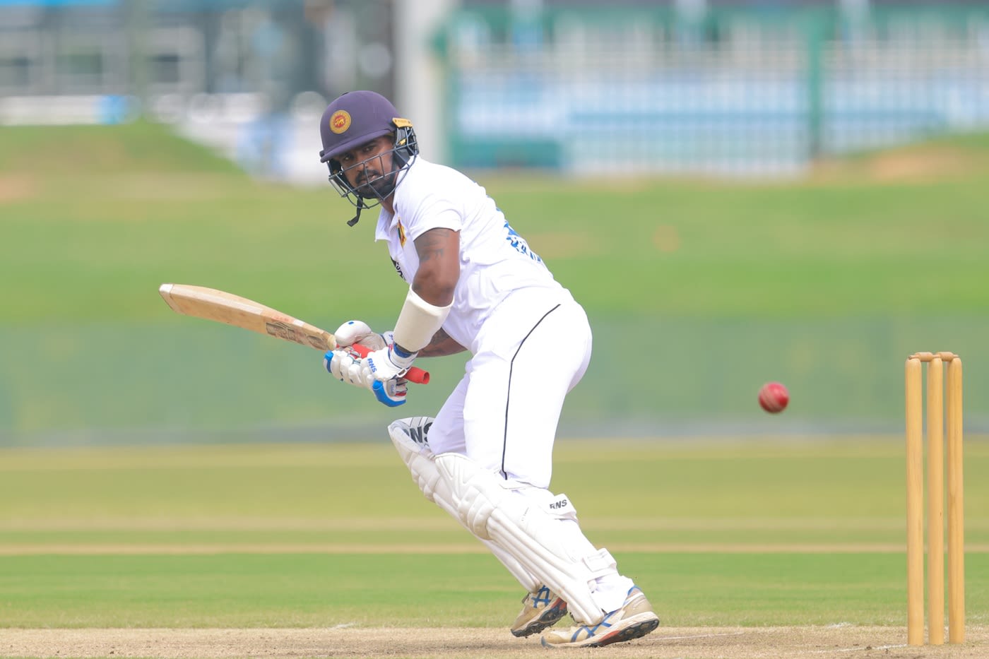 Ashen Bandara glances the ball away