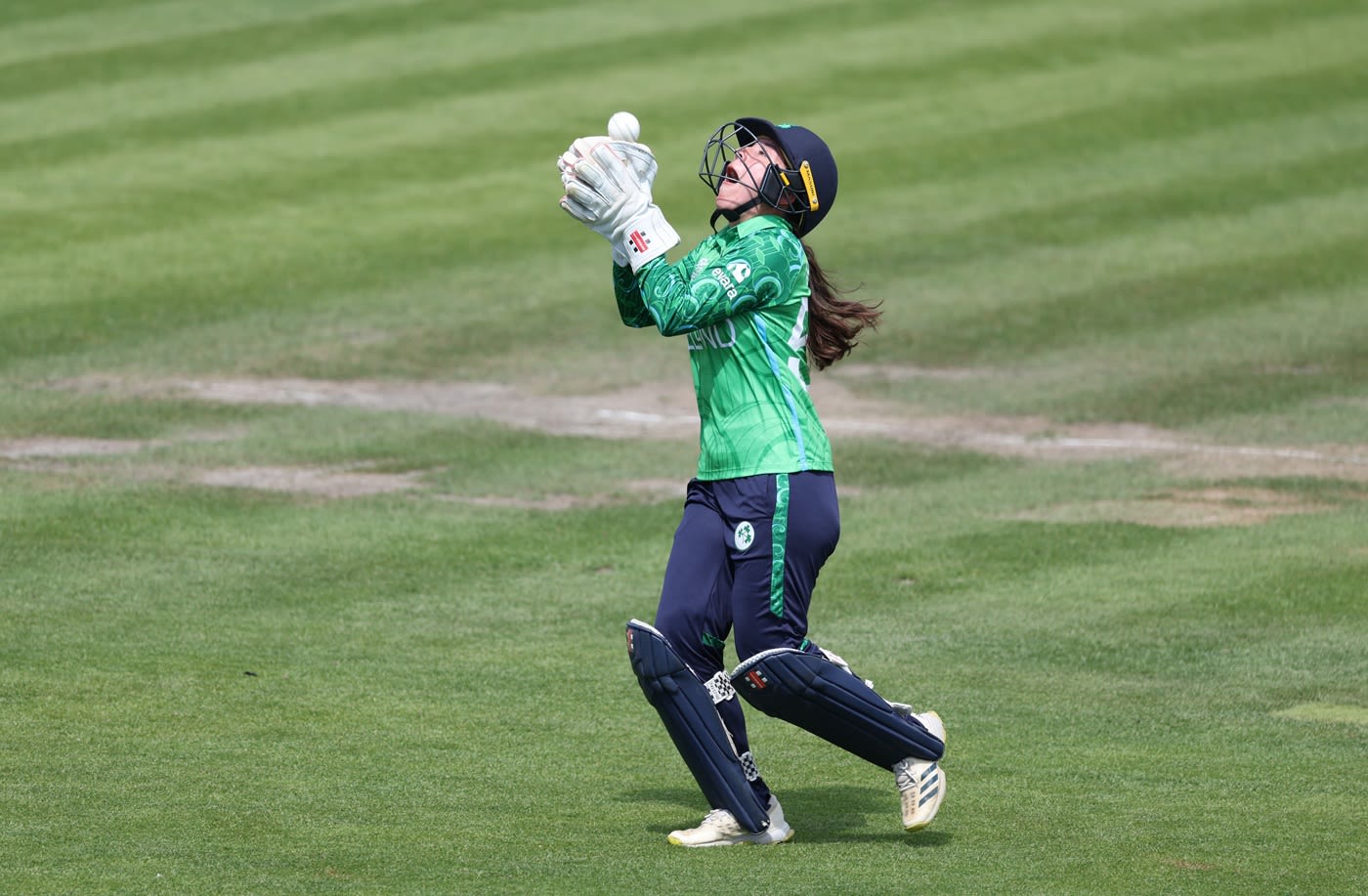 Amy Hunter completes a catch running backward