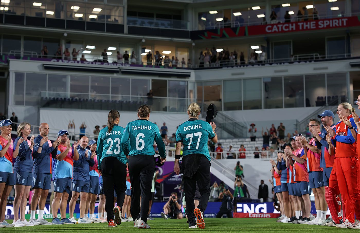 Suzie Bates, Lea Tahuhu and Sophie Devine are given a guard of honour